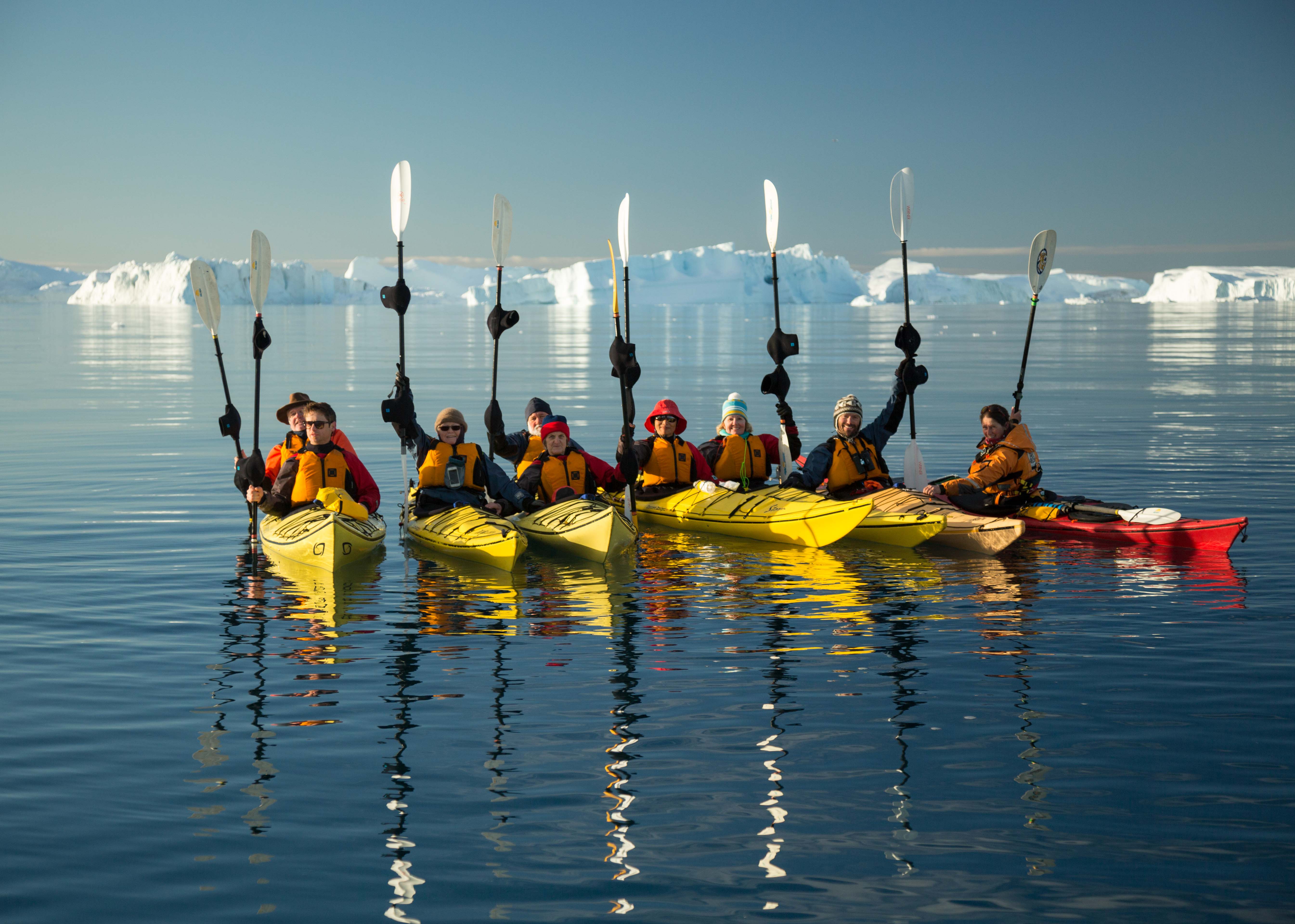 Quark Expeditions guests kayak in Ilulissat Icefjord in West Greenland.